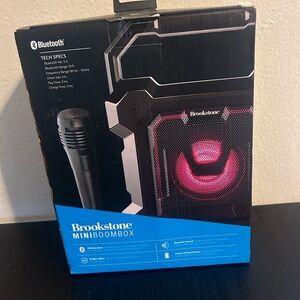 Brookstone speaker boombox with microphone